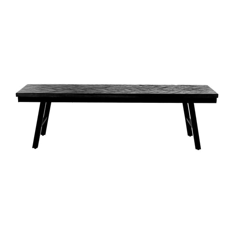 A sleek black wooden bench with a herringbone-patterned surface, featuring a minimalist design and angled legs, set against a plain white background.