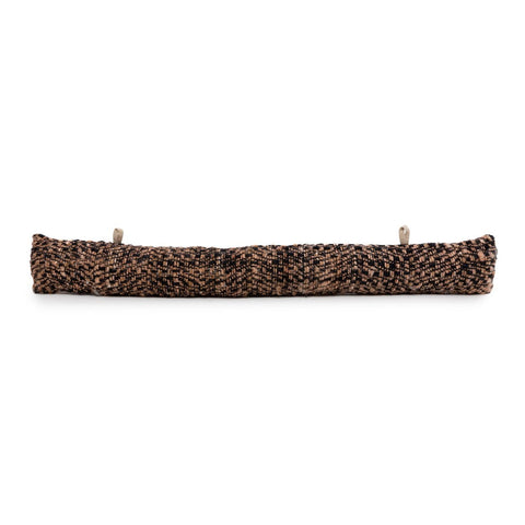 A textured brown and black woven doorstop, enhanced with two small, round burlap loops on each end, is perfect for adding a touch of rustic charm to your home decor while effectively blocking drafts at the bottom of any door.