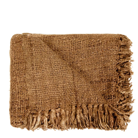 A folded, coarse-textured brown burlap blanket with fringe on the edges is displayed against a white background, exuding the charm of luxury hand-woven cotton.