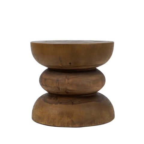 A handcrafted Mungurr wood stool with a unique, sculptural design featuring a round top and base. Its undulating, double-curved middle section boasts a natural wood finish, beautifully showcasing its spiral-shaped elegance crafted from exquisite natural materials.